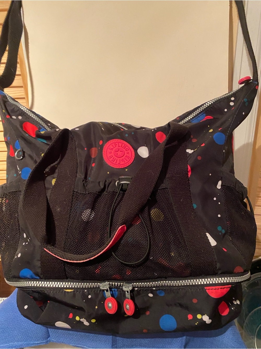 Kipling Black Travel Bag with Red, Blue, White, Yellow Paint-Dot Accents